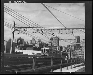 Key Train Coming++Key System train riding into San Francisco from the Bay Bridge. Photo by Dorothea Lange.