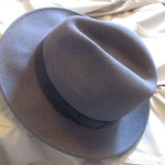 Beloved first Bouchercon fedora! Plain gray felt, inexpensive.