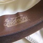 Department stores and hat shops used to stamp their names on the inside brims. This one is Gildners.